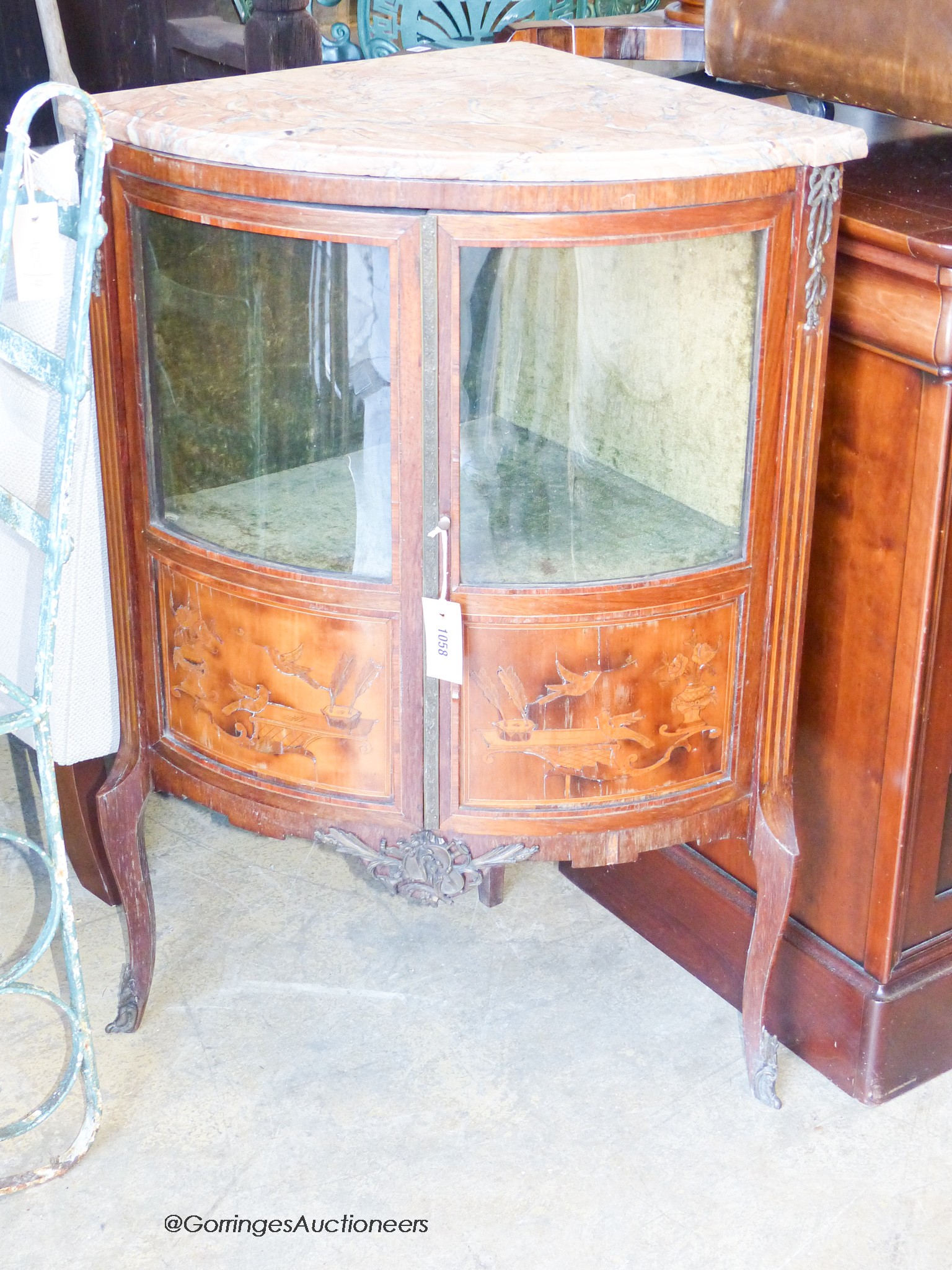 A 19th century French marquetry inlaid marble top bow front corner cabinet, width 66cm, depth 45cm, height 90cm